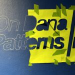 outlines of text (exhibition title) on blue wall: Building on Dana / Patterns in Space