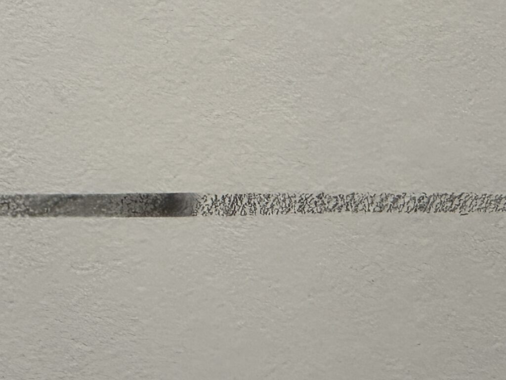 line of graphite, smudged